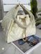 Жіноча шкіряна сумка Chanel Cargo Drawstring Bucket Bag молочно-кремова 54367325 фото 2