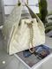 Жіноча шкіряна сумка Chanel Cargo Drawstring Bucket Bag молочно-кремова 54367325 фото 3